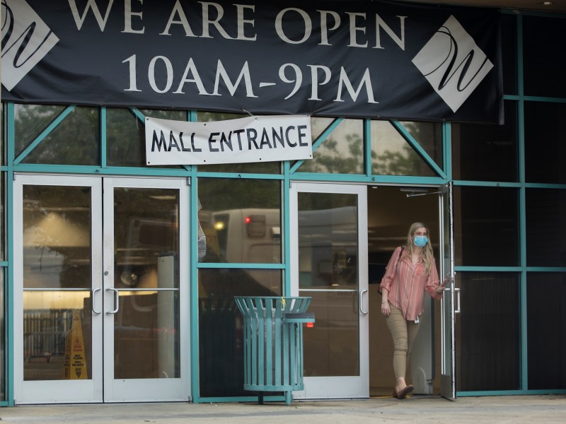 A woman exits the Wonderland of Americas shopping center on Thursday.