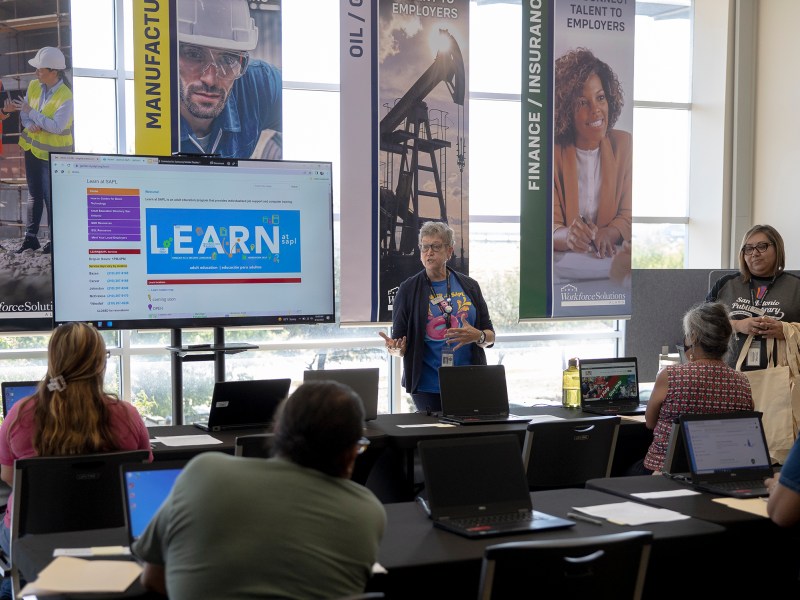 Staff members from the San Antonio Public Library host a computer literacy class at the Workforce Solutions Alamo Career Center at the San Antonio Food Bank on Friday.