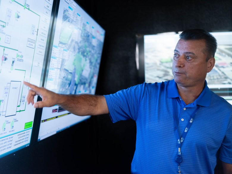 Elroy Bishop with SAWS points to the cooling system that spans through downtown San Antonio which circulates recycled water for vital air conditioning systems.