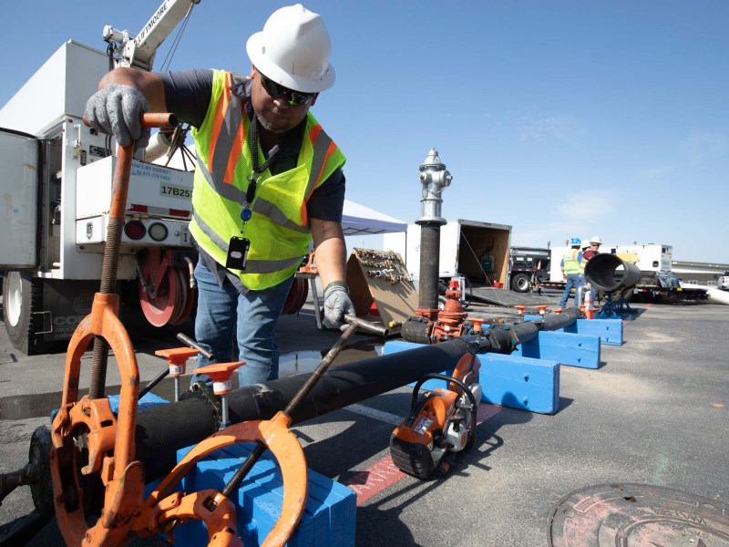 Gilbert Santos, a SAWS manager of Northeast operations for distribution and collection demonstrates how a reed cutter is used on aging cast iron pipes found much of San Antonio's inner city.