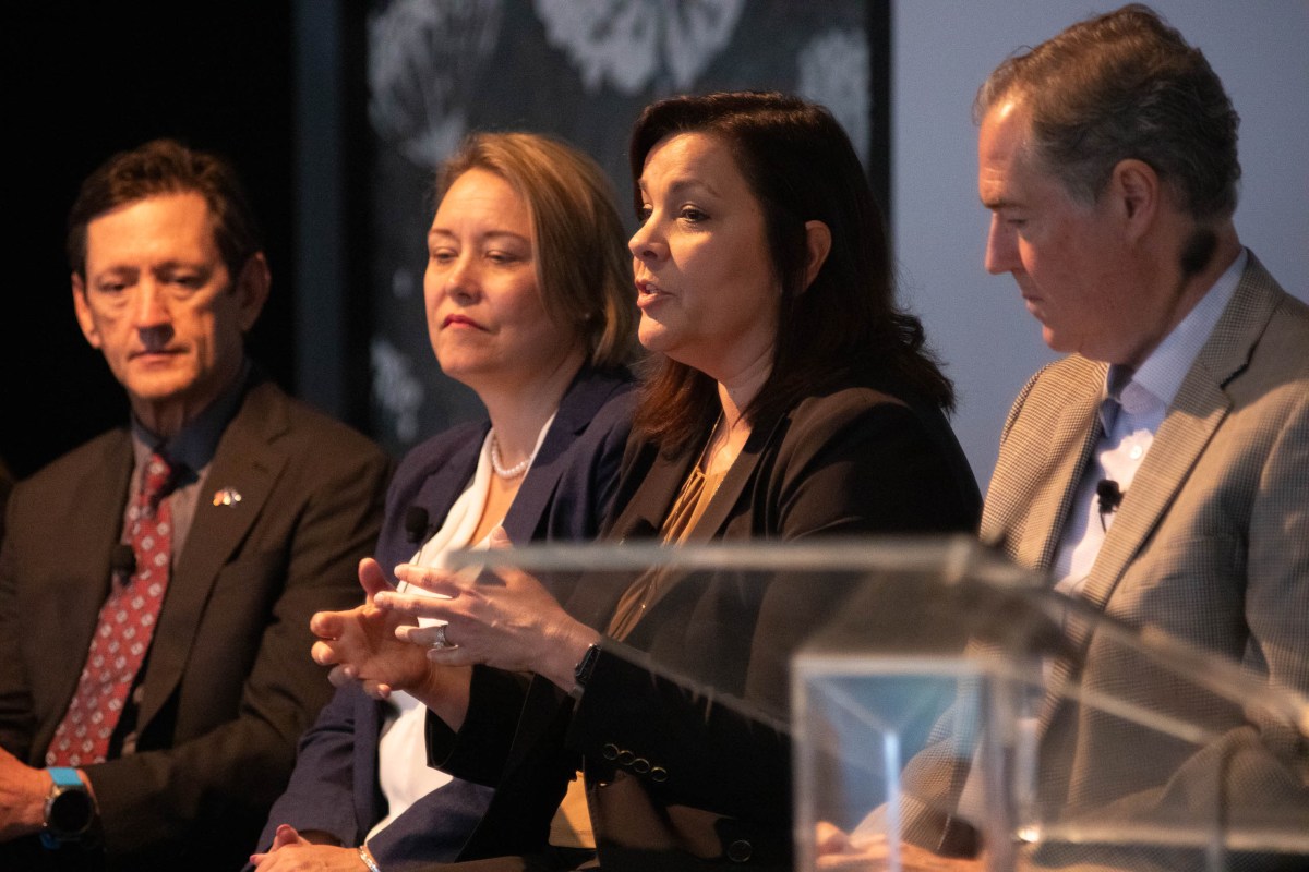 Andrea Marks, second from right, senior vice president and chief operating officer at UT Health discusses employee culture and in-person medical training with her personnel.