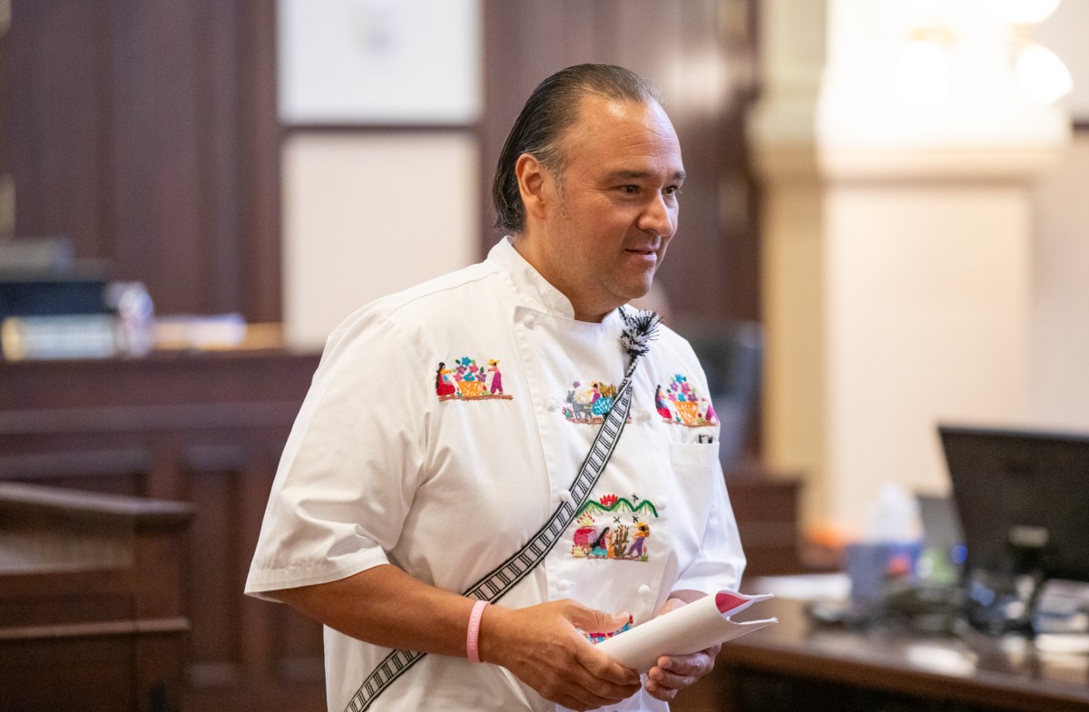 Chef Johnny Hernandez appears before Bexar County Commissioners Court on Tuesday where a $250,000 grant was awarded to his foundation.