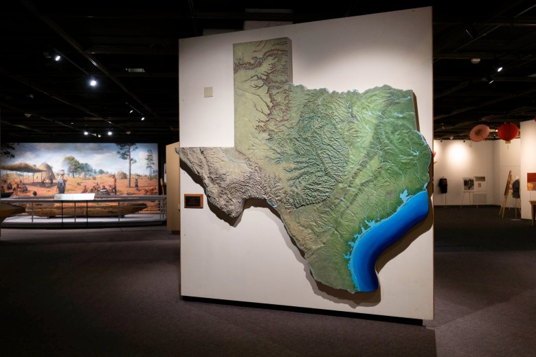 A large topographical map of Texas and the adjacent Gulf Coast is one of the first exhibits greeting visitors upon arriving to the Institute of Texan Cultures.