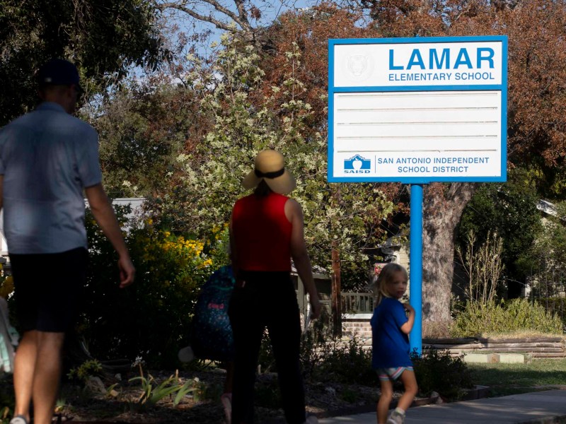 The Gabrielson family walks home after school with their two children who attend Lamar Elementary School.