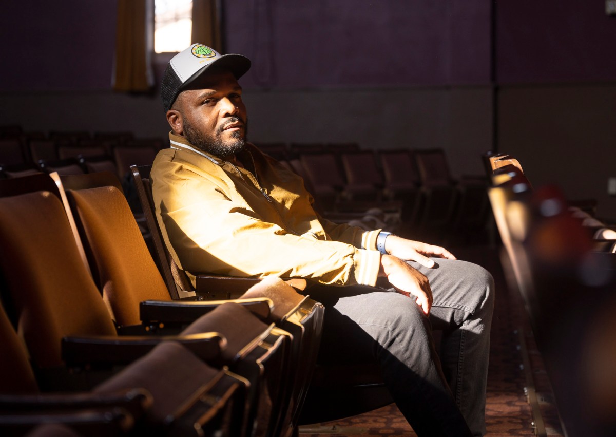 Maverick Pascal sits at the Carver Community Cultural Center where his work will be shown.