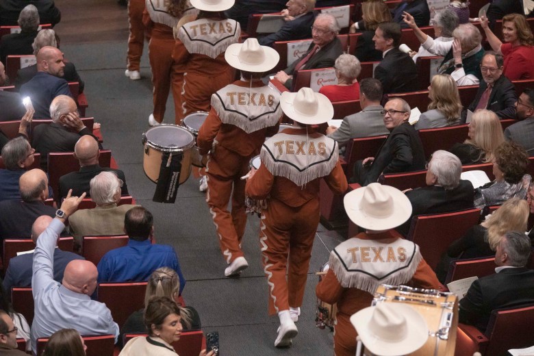 University of Texas Longhorn Band during the funeral services of Billy Joe "Red" McCombs at the Tobin Center for the Performing Arts on Monday.