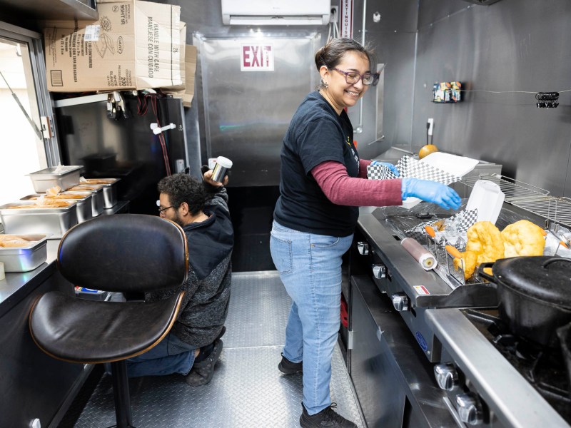 Zhertiam and Chris Gonzales prepare a variety of frybread in preparation for the Briscoe Western Art Museum's Yanaguana Indian Arts Festival.