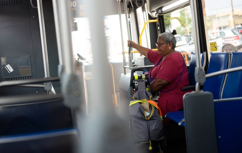 Margarita Rubio rides the bus to get into the zone where VIA's Link can pick her up. 