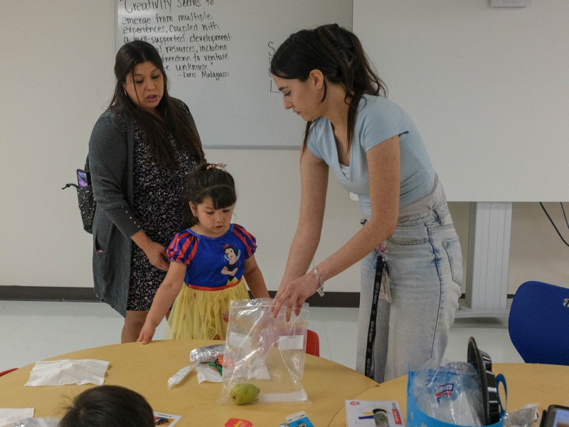 Monica Tijerina, left, drops off her daughter London, 5, off at the Young Jaguars childcare program at Texas A&M University San Antonio.