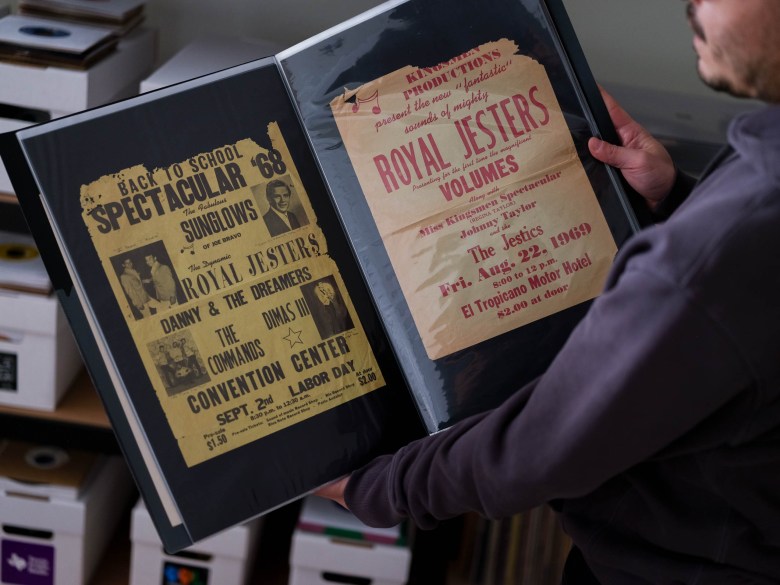 Rae Cabello flips through a catalogue of preserved concert flyers from bands like The Royal Jesters who were some of the pioneers of the West Side Sound.