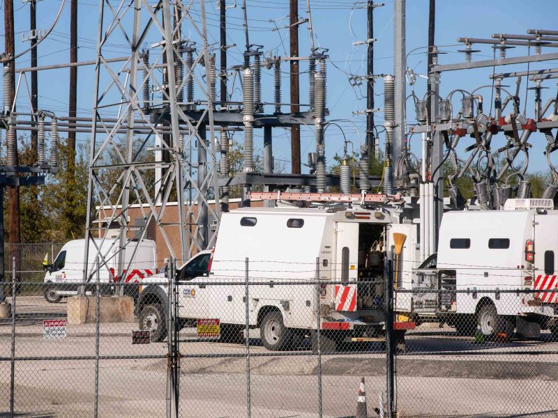 CPS Energy crews work at a power station on the South Side near Presa Street.